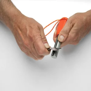 Mag Striker in hands on white